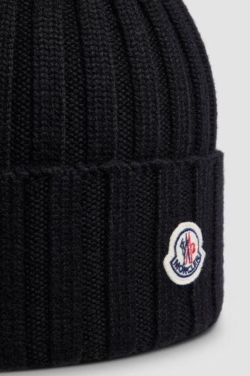 BONNET EN LAINE AVEC POMPON - NOIR / UNI